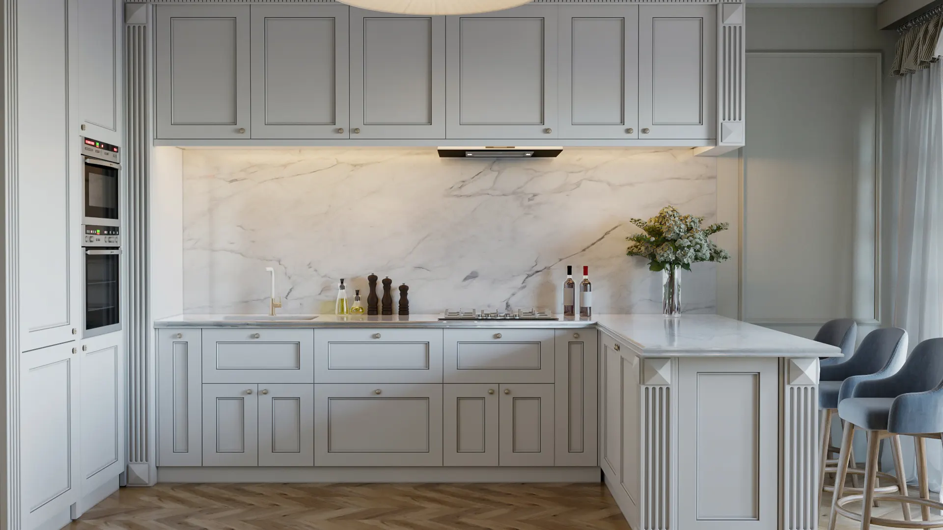 A elegant, modern neoclassical kitchen featuring light gray shaker-style cabinetry, a luxurious marble backsplash and countertop, and a peninsula with blue velvet bar stools.